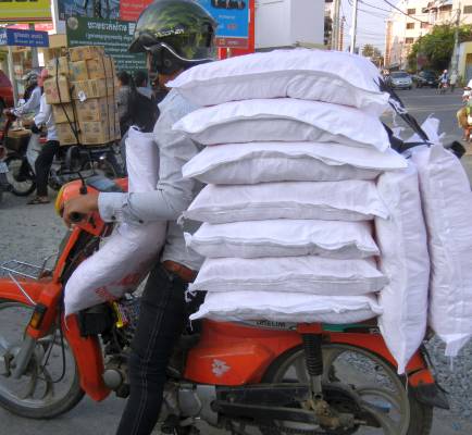 Two heavily loaded motorcycles